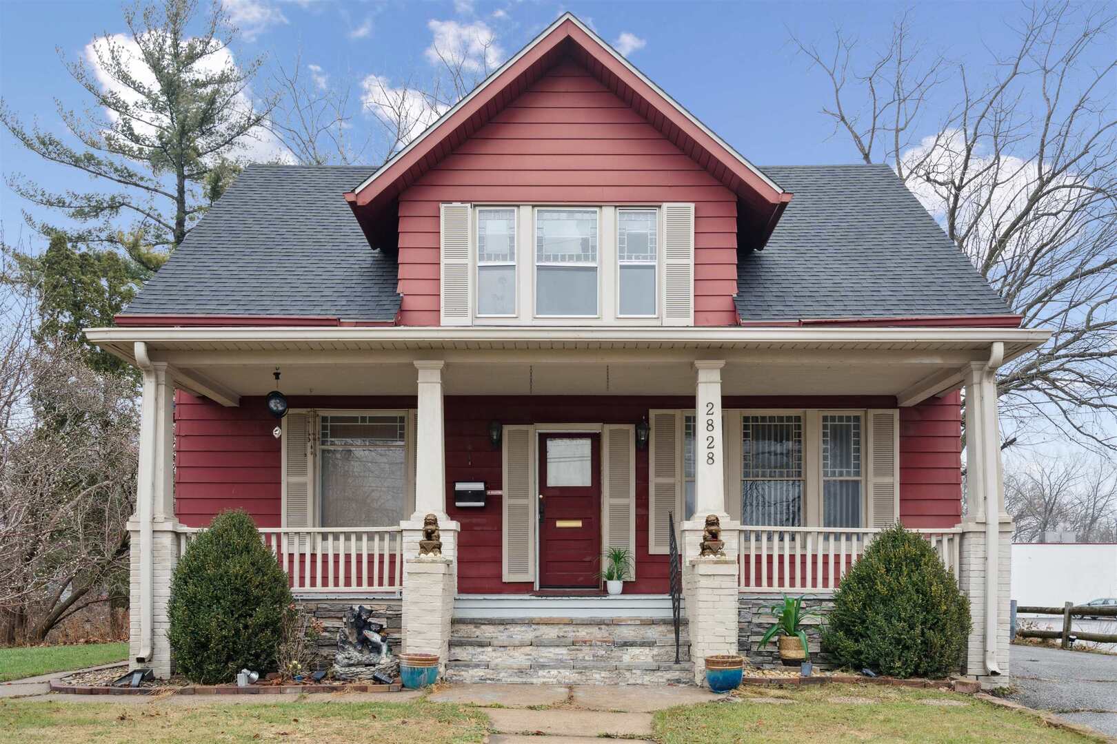 2828 16th Street Moline, IL 61265 - Photo 2 of 39 a front view of a house with a yard