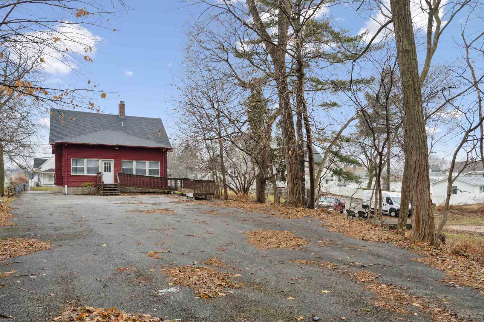 2828 16th Street Moline, IL 61265 - Photo 28 of 39 a view of a house with a yard and garage