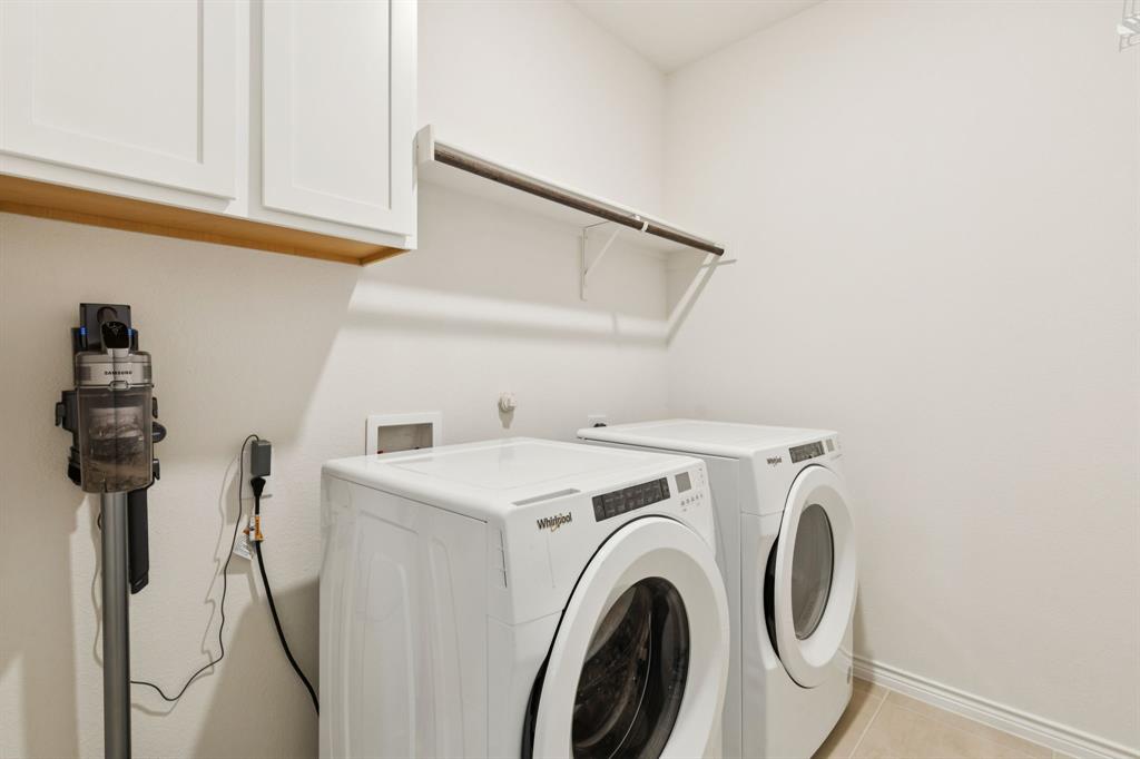 3400 Honey Hl Road Aubrey, TX 76227 - Photo 19 of 39 a utility room with dryer and washer
