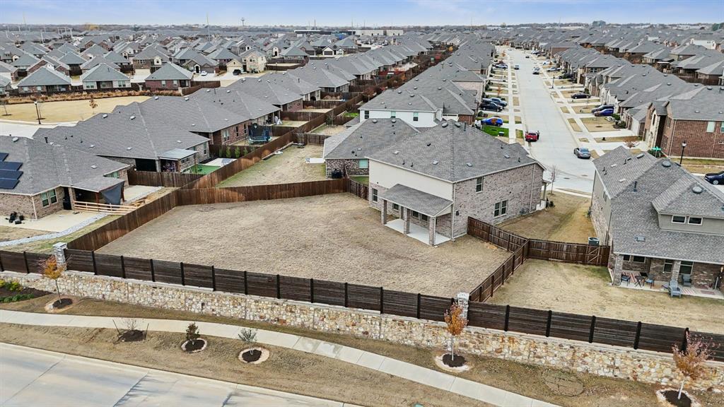 3400 Honey Hl Road Aubrey, TX 76227 - Photo 38 of 39 an aerial view of residential houses with outdoor space