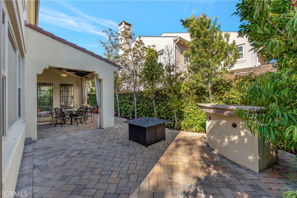 83 Navigator Irvine, CA 92620 - Photo 14 of 19 a view of a patio with chair and tables