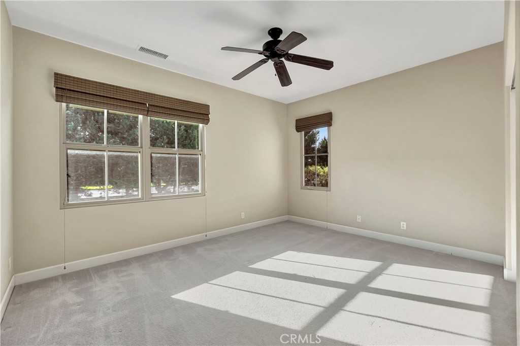 83 Navigator Irvine, CA 92620 - Photo 8 of 19 a view of empty room with ceiling fan