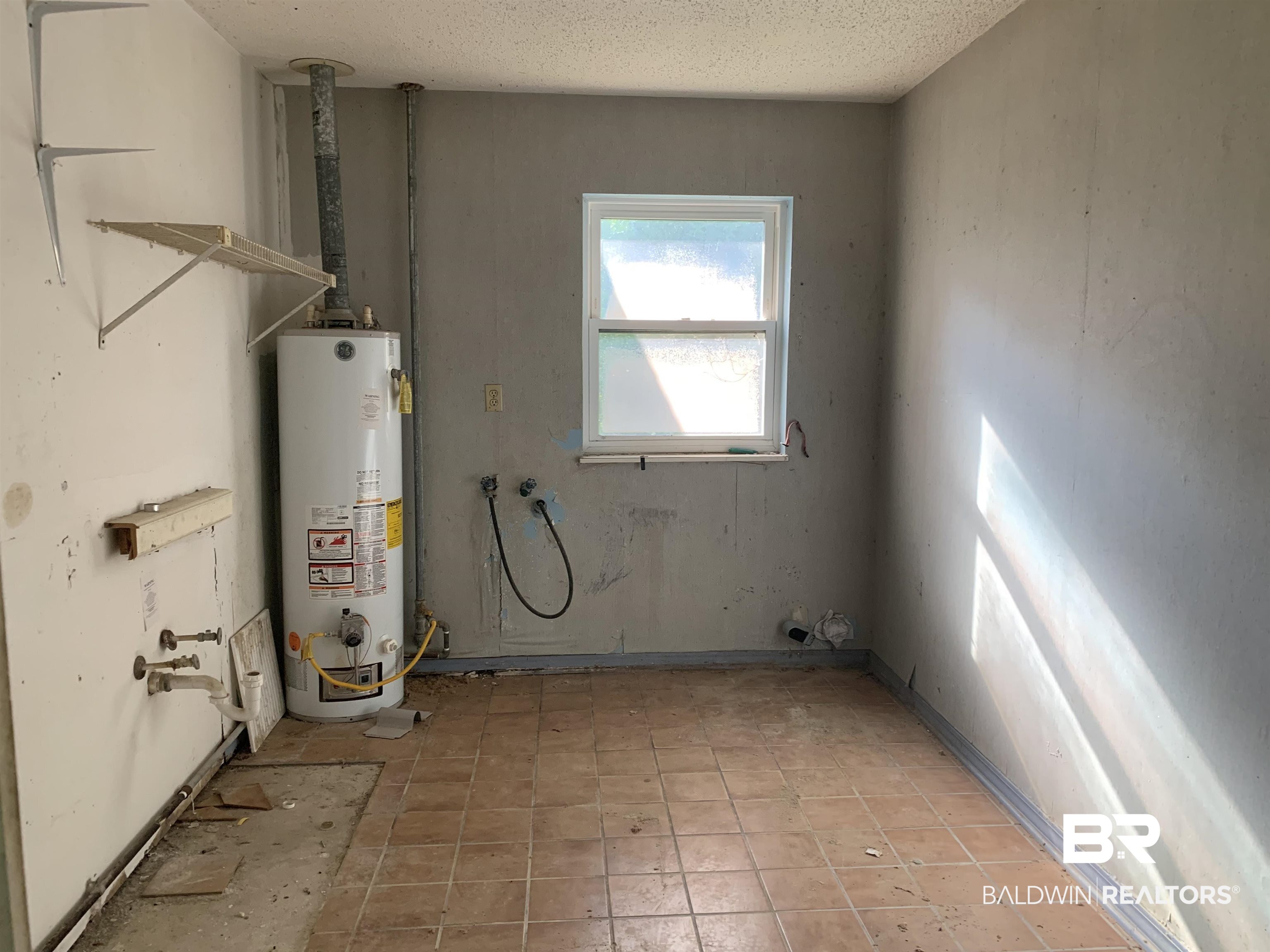 705 Artillery Range Street Daphne, AL 36527 - Photo 4 of 10 Large Laundry Room
