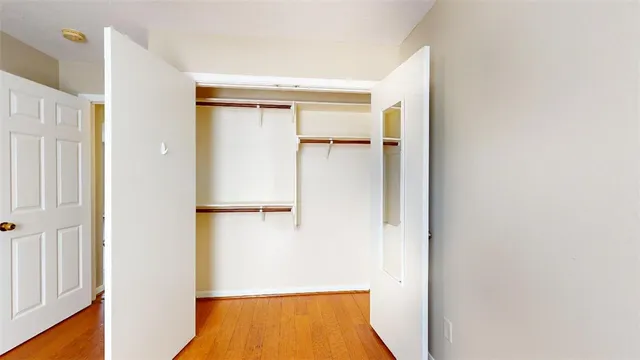 a view of walk in closet with window