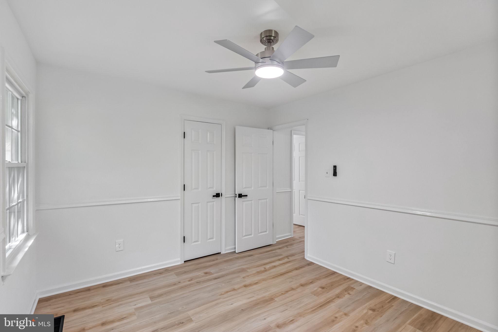 3 Boston Cove Ruther Glen, VA 22546 - Photo 22 of 30 a view of an empty room with wooden floor