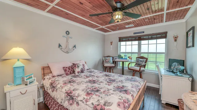 a bed room with a bed and a chair