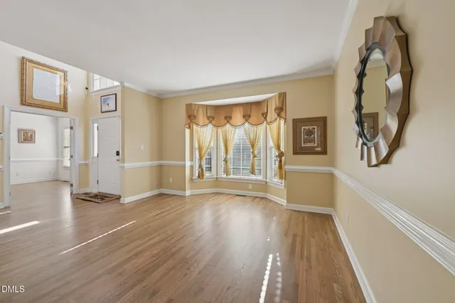 a view of a swimming pool with a ceiling fan