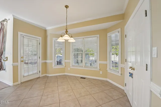 a kitchen with stainless steel appliances granite countertop a refrigerator stove top oven a sink and dishwasher