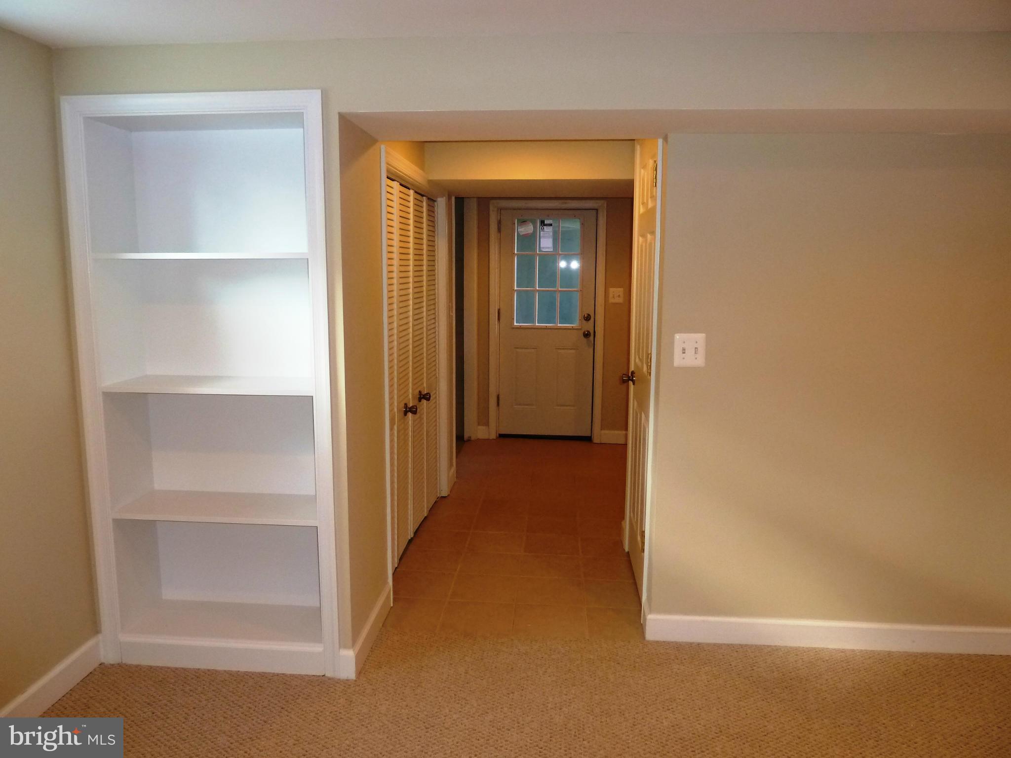 2207 Dexter Avenue Silver Spring, MD 20902 - Photo 19 of 23 Exterior exit and built in storage