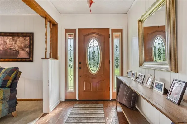 a view of front door with furniture