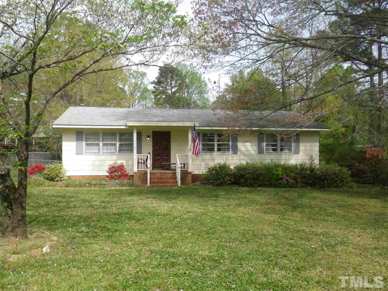 5024 Wickham Road Raleigh, NC 27606 - Photo 1 of 14 a front view of house with yard and green space