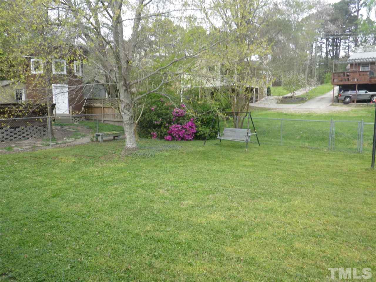 5024 Wickham Road Raleigh, NC 27606 - Photo 13 of 14 a view of a park with large trees