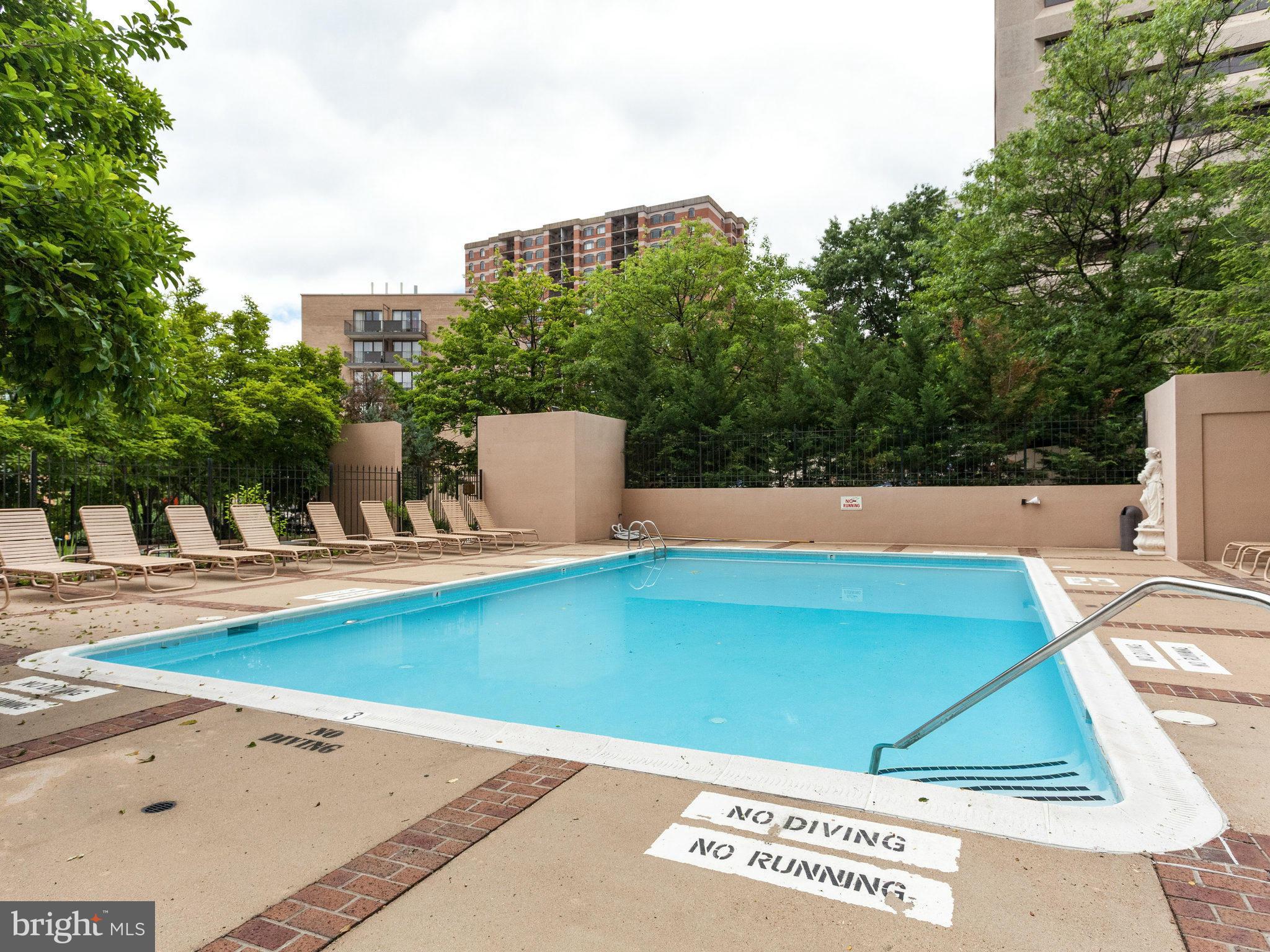 1301 North Courthouse Road, Unit 1411 Arlington, VA 22201 - Photo 24 of 30 a view of swimming pool with a yard