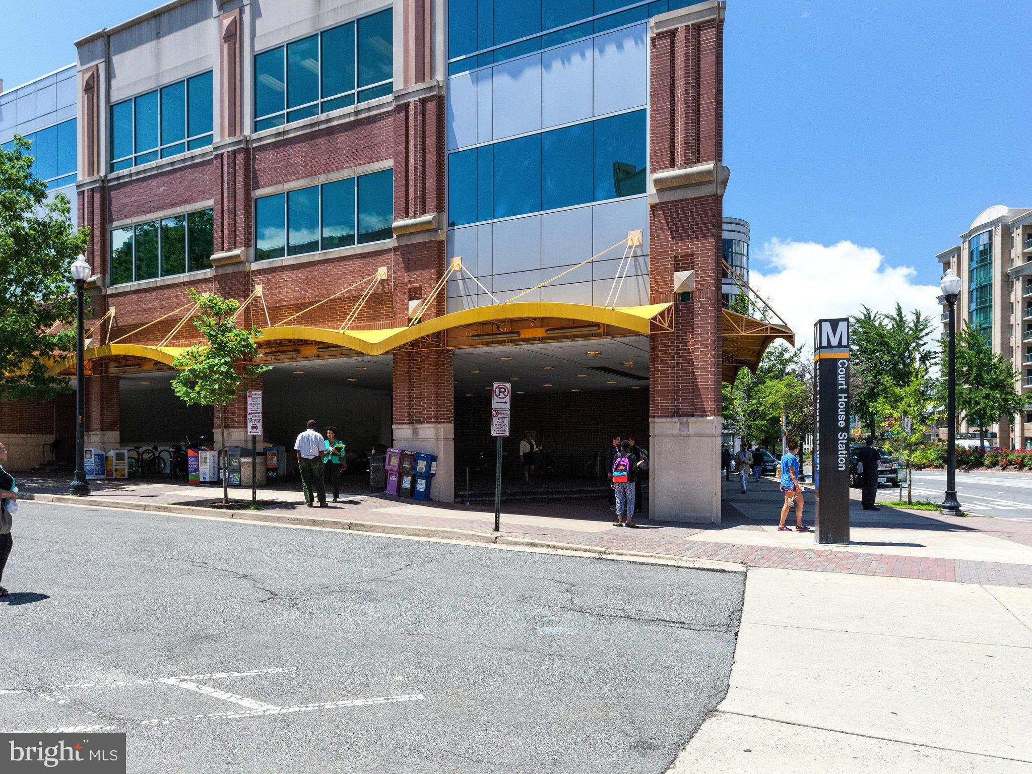 1301 North Courthouse Road, Unit 1411 Arlington, VA 22201 - Photo 26 of 30 a view of a building with a people on a street
