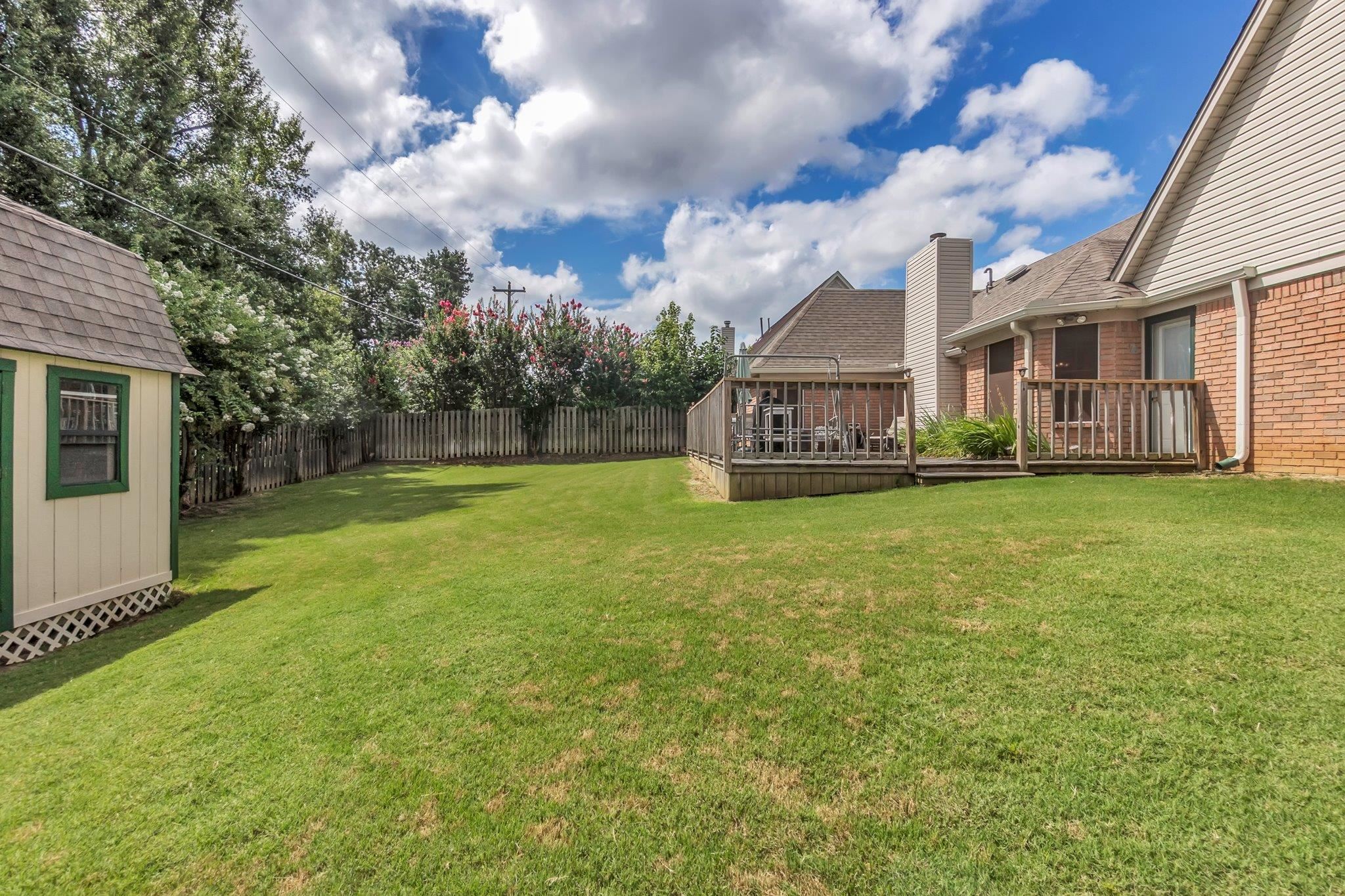 4020 Altruria Road Bartlett, TN 38135 - Photo 23 of 25 Expansive lawn with a full privacy fence and mature trees
