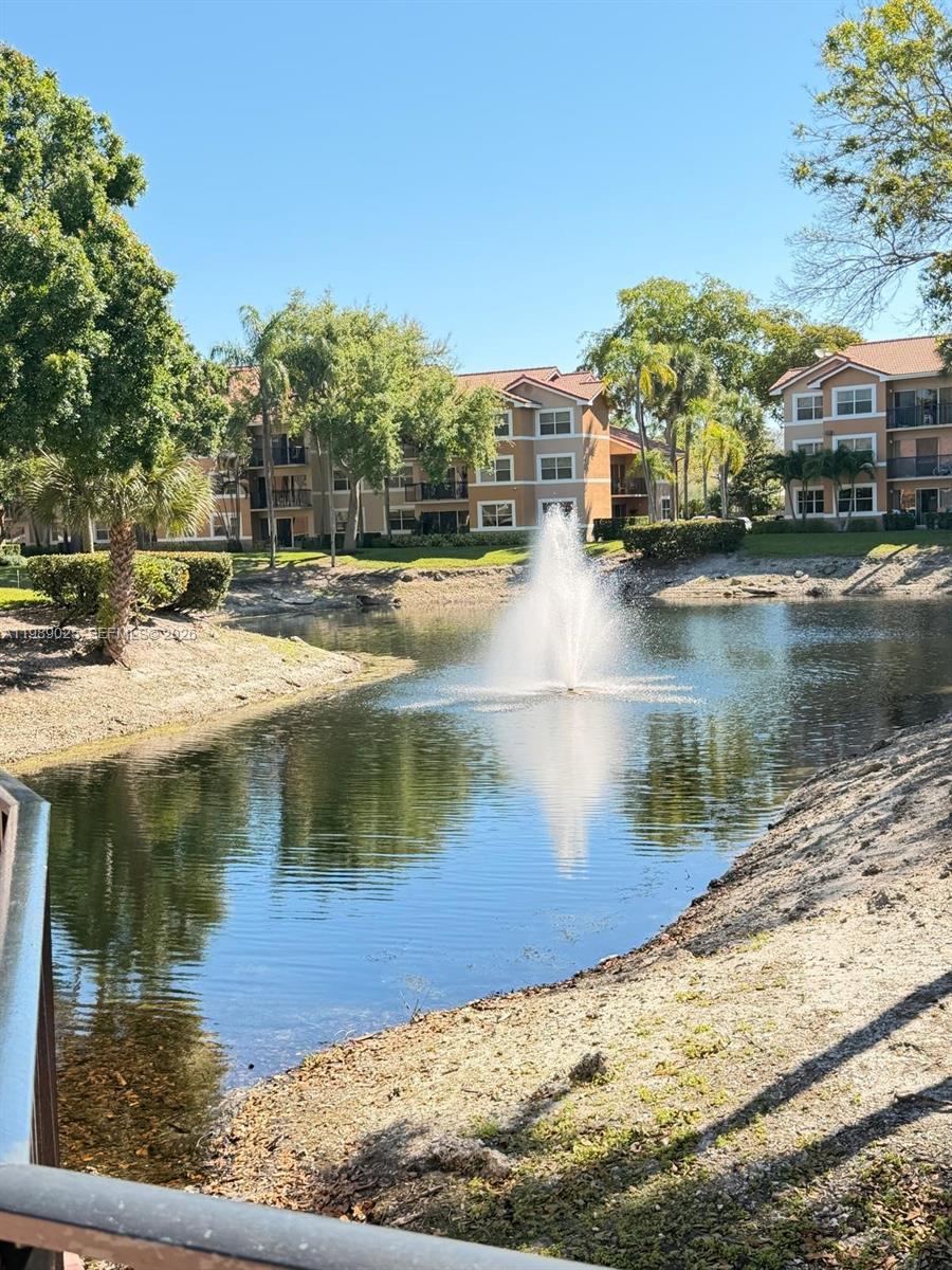 8821 Wiles Road, Unit 108 Coral Springs, FL 33067 - Photo 26 of 46 a view of a lake view