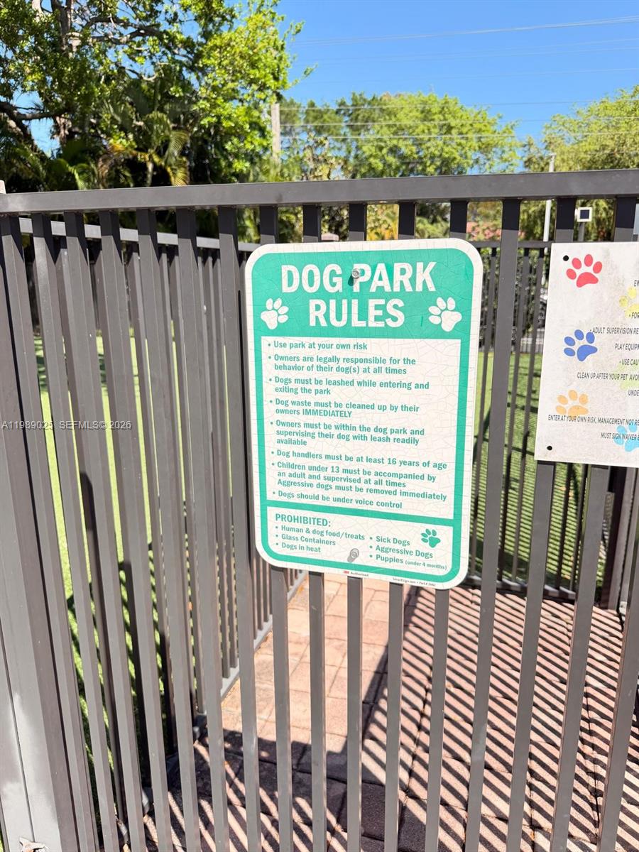 8821 Wiles Road, Unit 108 Coral Springs, FL 33067 - Photo 42 of 46 a view of a balcony with wooden floor