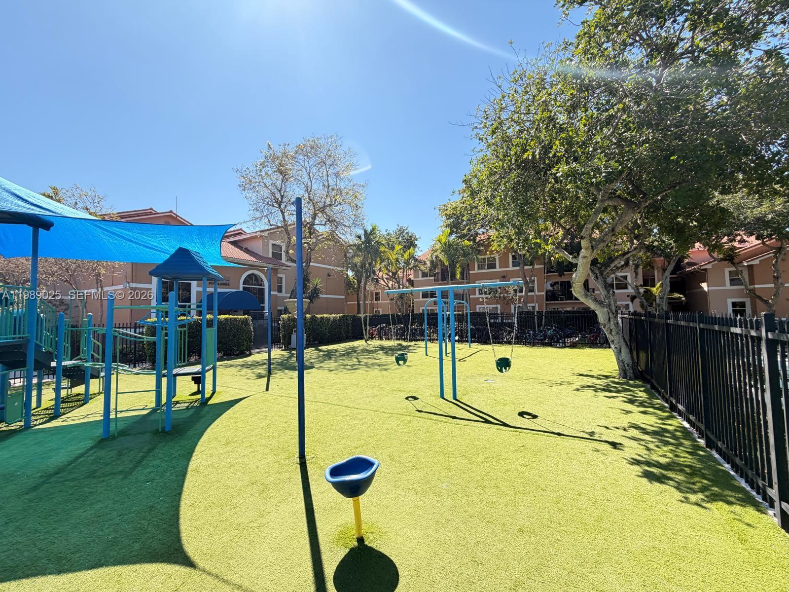 8821 Wiles Road, Unit 108 Coral Springs, FL 33067 - Photo 45 of 46 a view of swimming pool