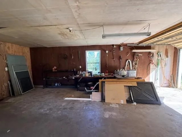 a kitchen with a sink and a refrigerator