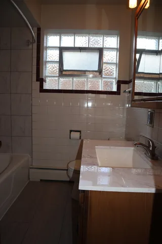 a bathroom with a sink and a bathtub