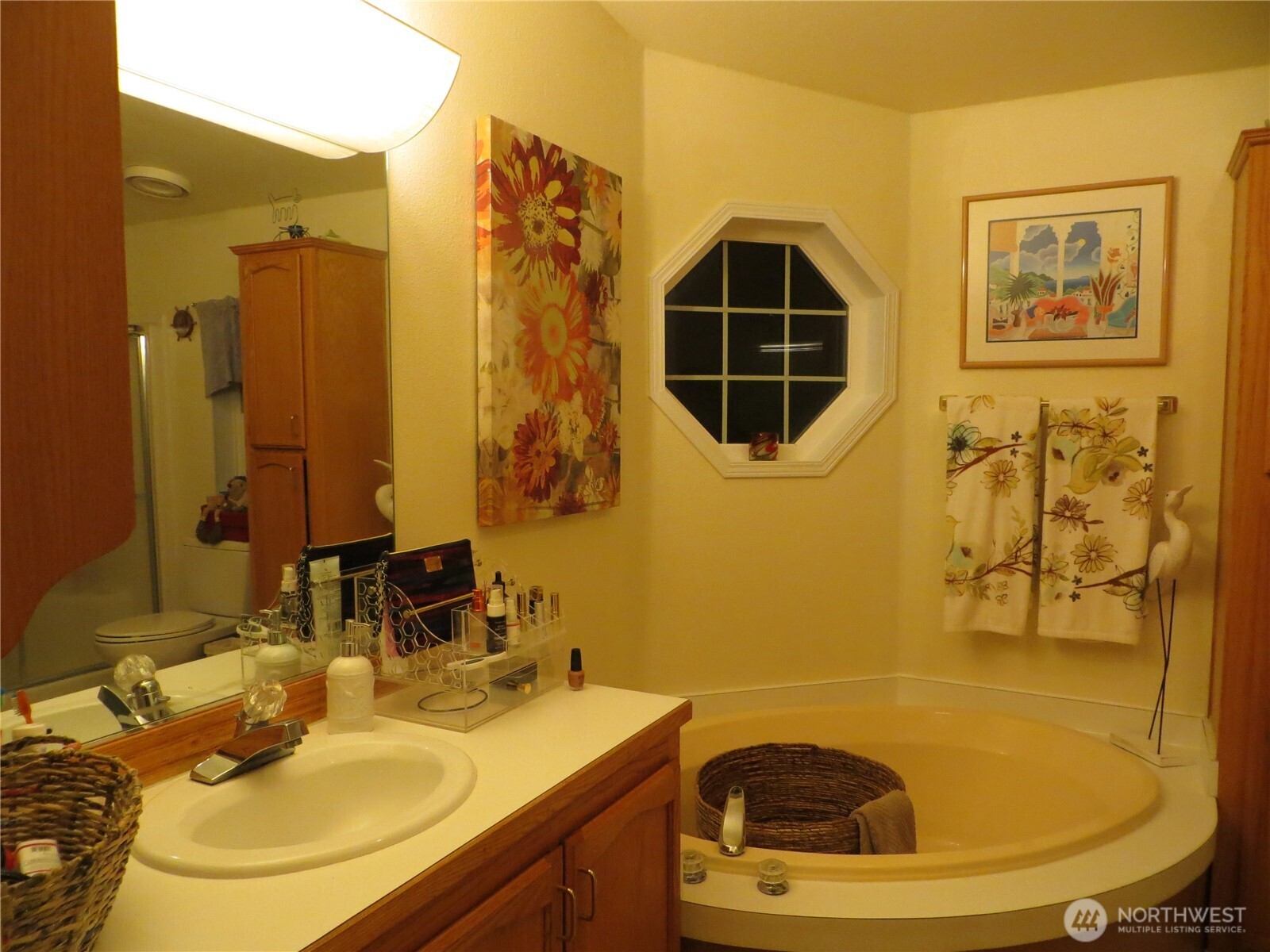 23800 Southeast Tiger Mountain Road Issaquah, WA 98027 - Photo 12 of 21 a bathroom with a sink and a mirror