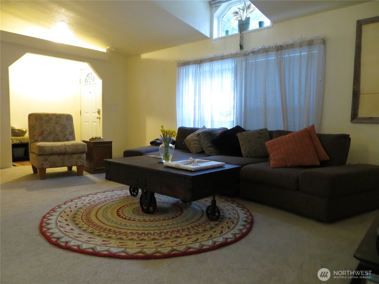 23800 Southeast Tiger Mountain Road Issaquah, WA 98027 - Photo 19 of 21 a living room with furniture and a chandelier