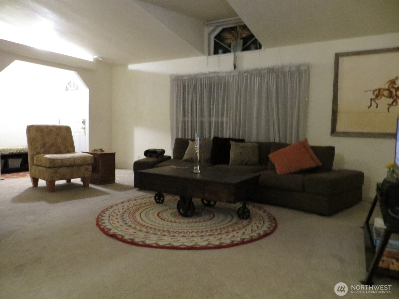 23800 Southeast Tiger Mountain Road Issaquah, WA 98027 - Photo 10 of 21 a living room with furniture and a lamp