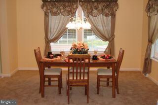 31629 Melson Road Delmar, MD 21875 - Photo 3 of 12 a view of a dining room with furniture and window