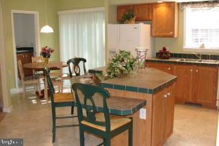 31629 Melson Road Delmar, MD 21875 - Photo 4 of 12 a dining room with furniture and window