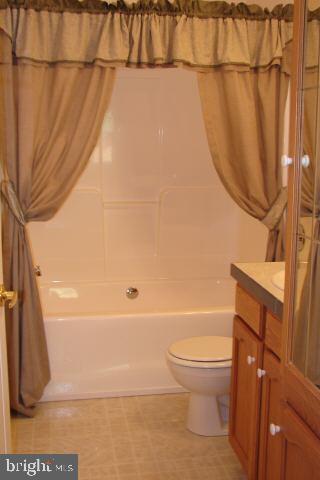 31629 Melson Road Delmar, MD 21875 - Photo 7 of 12 a bathroom with a toilet and a shower