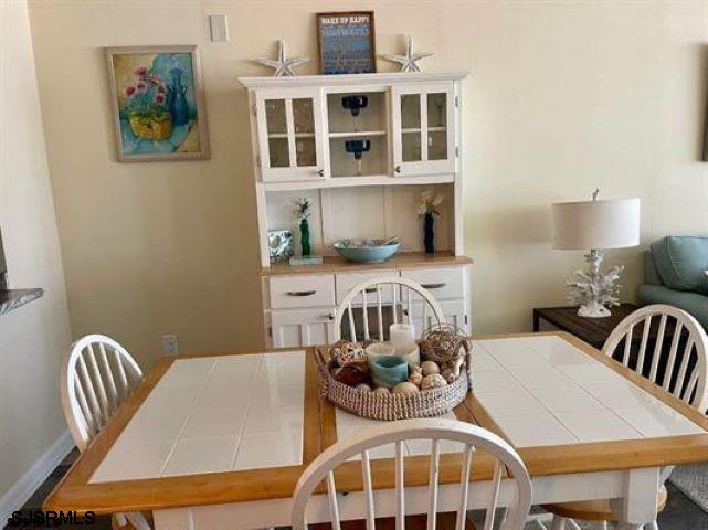 4500 West Brigantine Avenue, Unit 1314 Brigantine, NJ 08203 - Photo 4 of 11 a bedroom with furniture and wooden floor