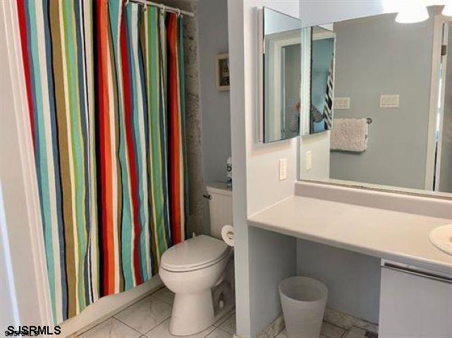 4500 West Brigantine Avenue, Unit 1314 Brigantine, NJ 08203 - Photo 10 of 11 a bathroom with a toilet and a sink