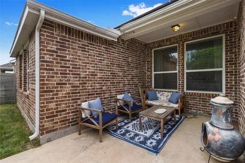 a view of a backyard with a garden