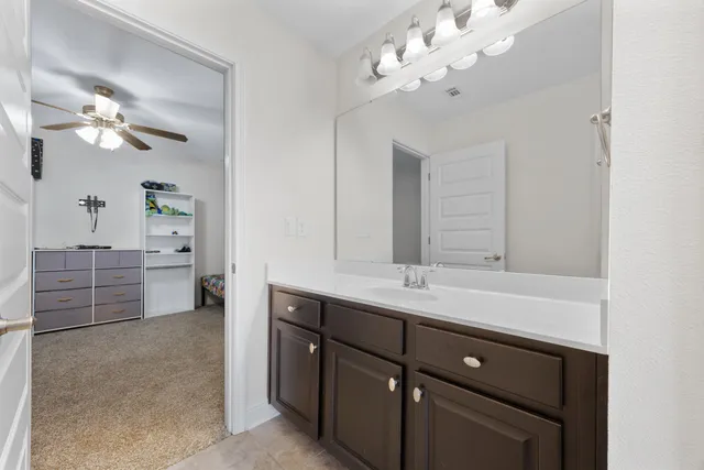 a bathroom with a shower and a toilet