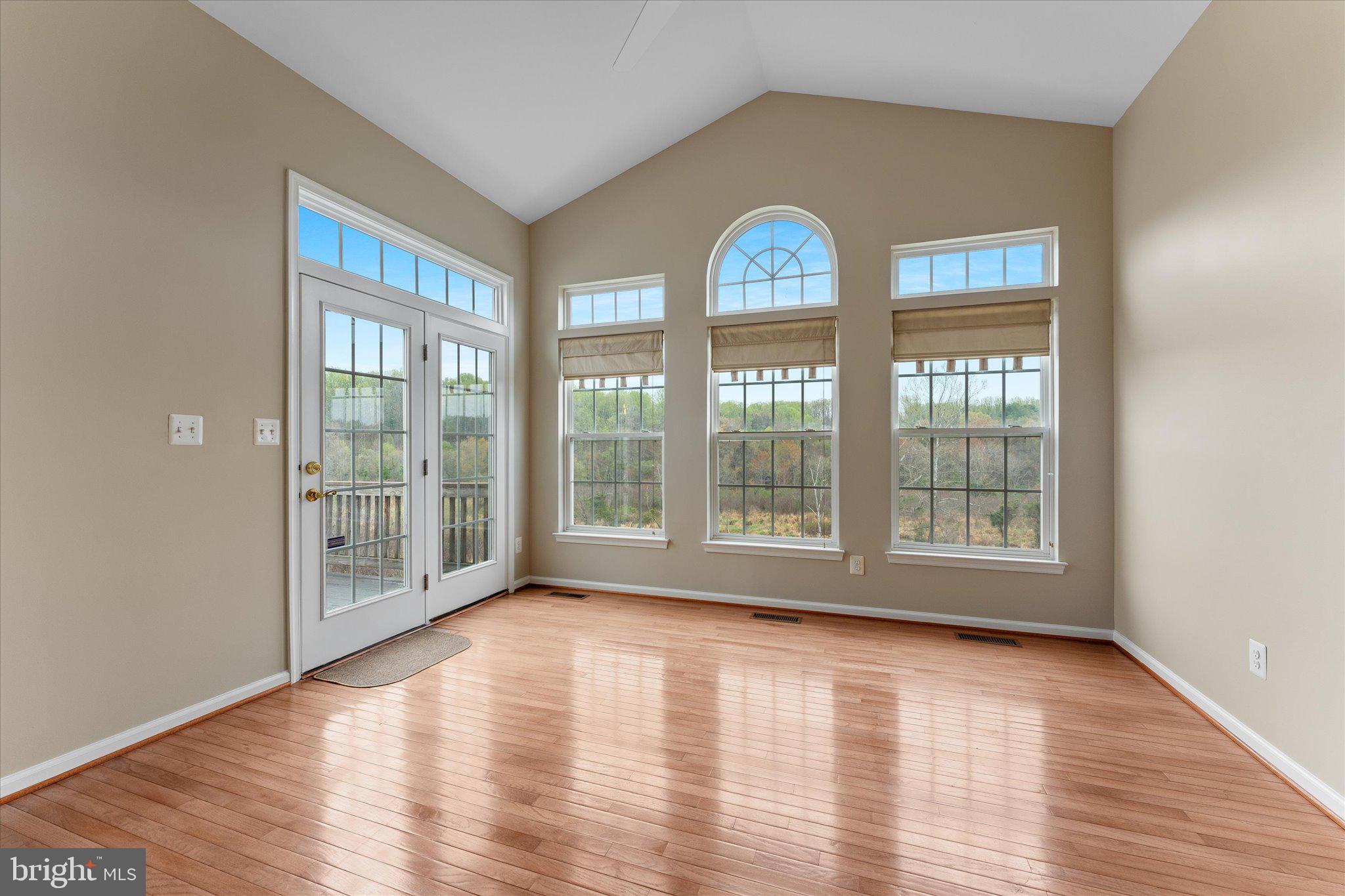 6696 Stream View Lane Warrenton, VA 20187 - Photo 13 of 57 a view of empty room with wooden floor and fan
