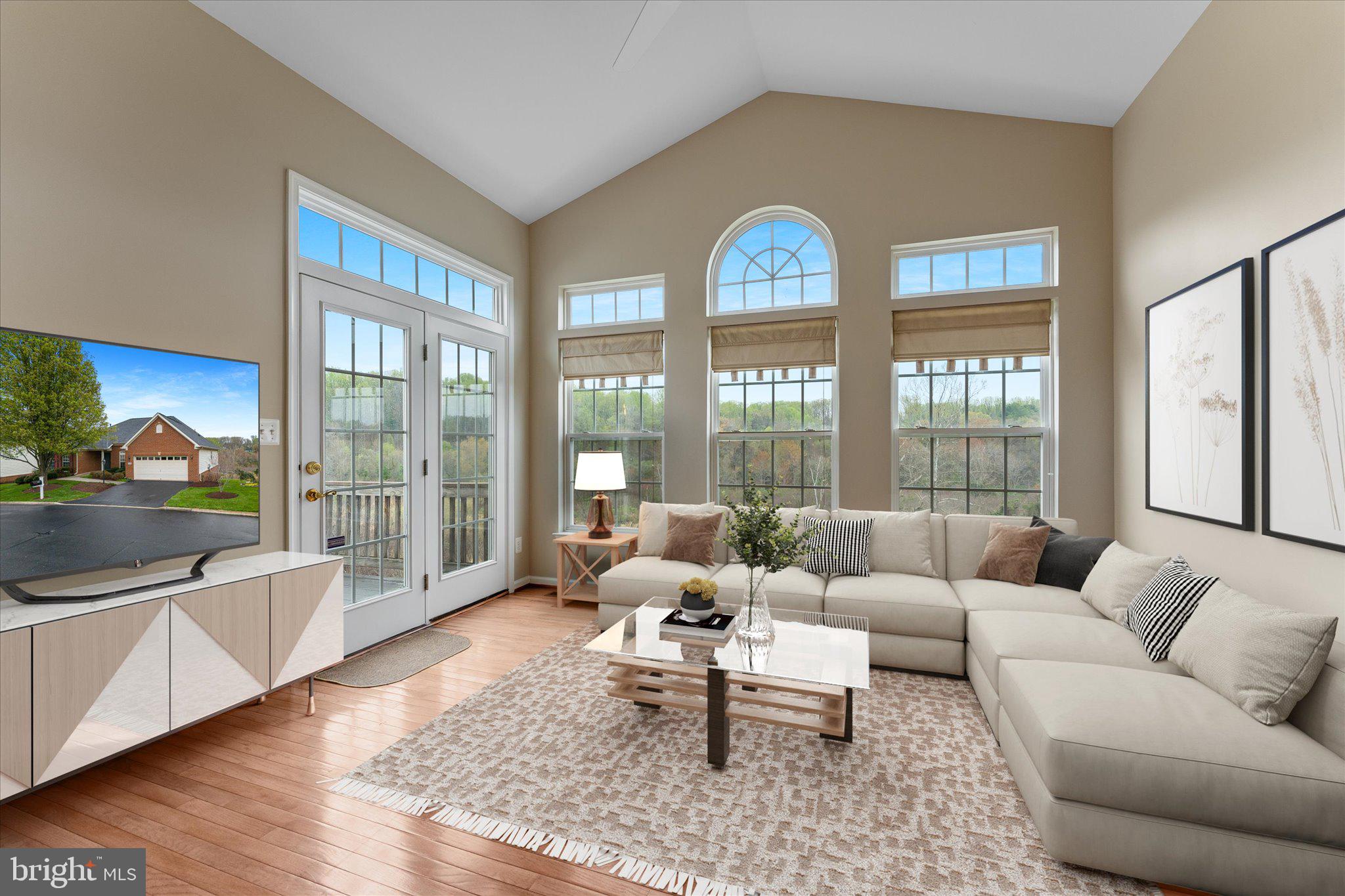 6696 Stream View Lane Warrenton, VA 20187 - Photo 14 of 57 a living room with furniture and a large window