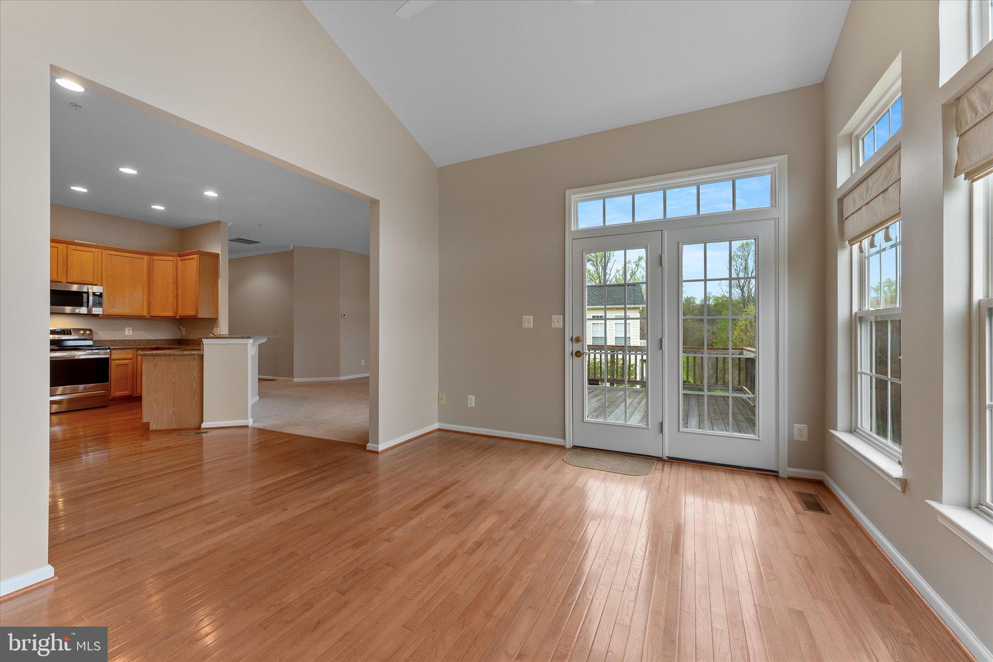 6696 Stream View Lane Warrenton, VA 20187 - Photo 15 of 57 a view of kitchen with wooden floor and a window