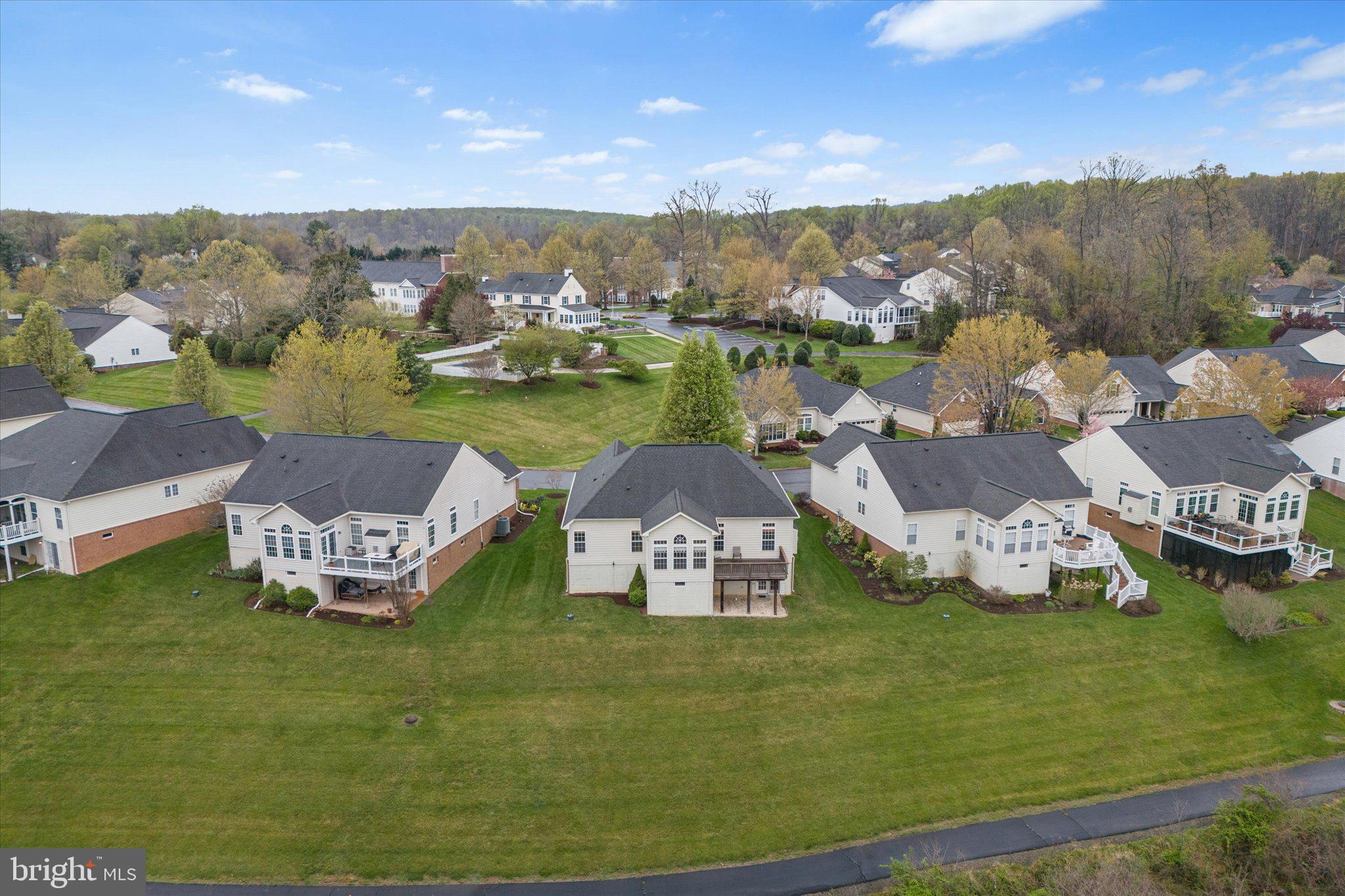 6696 Stream View Lane Warrenton, VA 20187 - Photo 53 of 57 a view of a lake with a mountain in the background