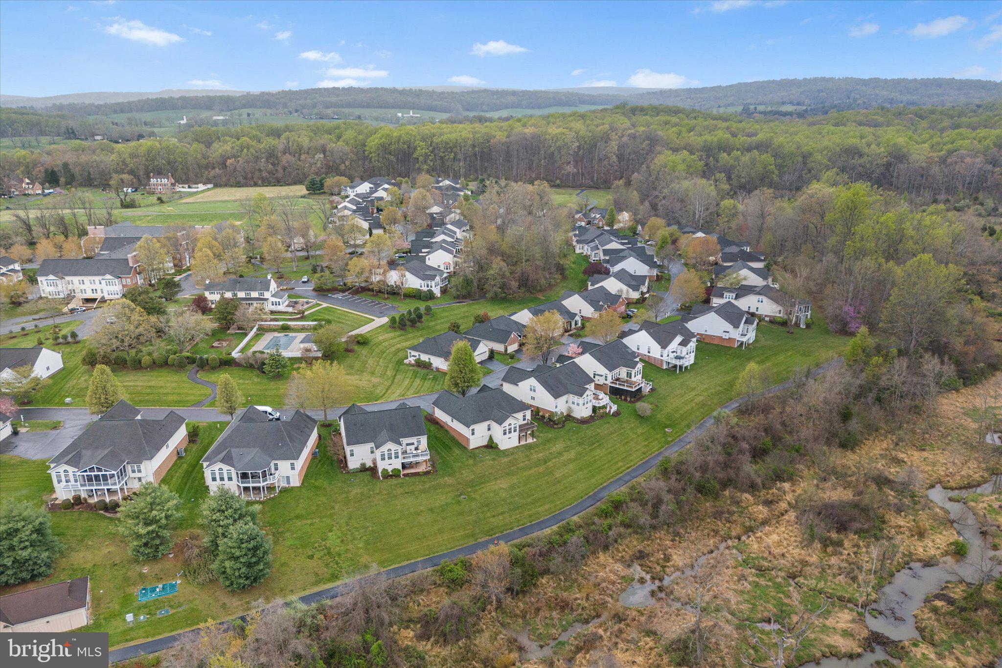 6696 Stream View Lane Warrenton, VA 20187 - Photo 56 of 57 a view of a lake with a city