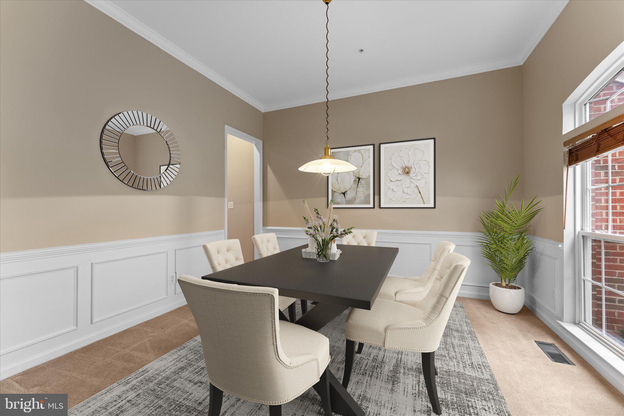 6696 Stream View Lane Warrenton, VA 20187 - Photo 7 of 57 a view of a dining room with furniture and wooden floor