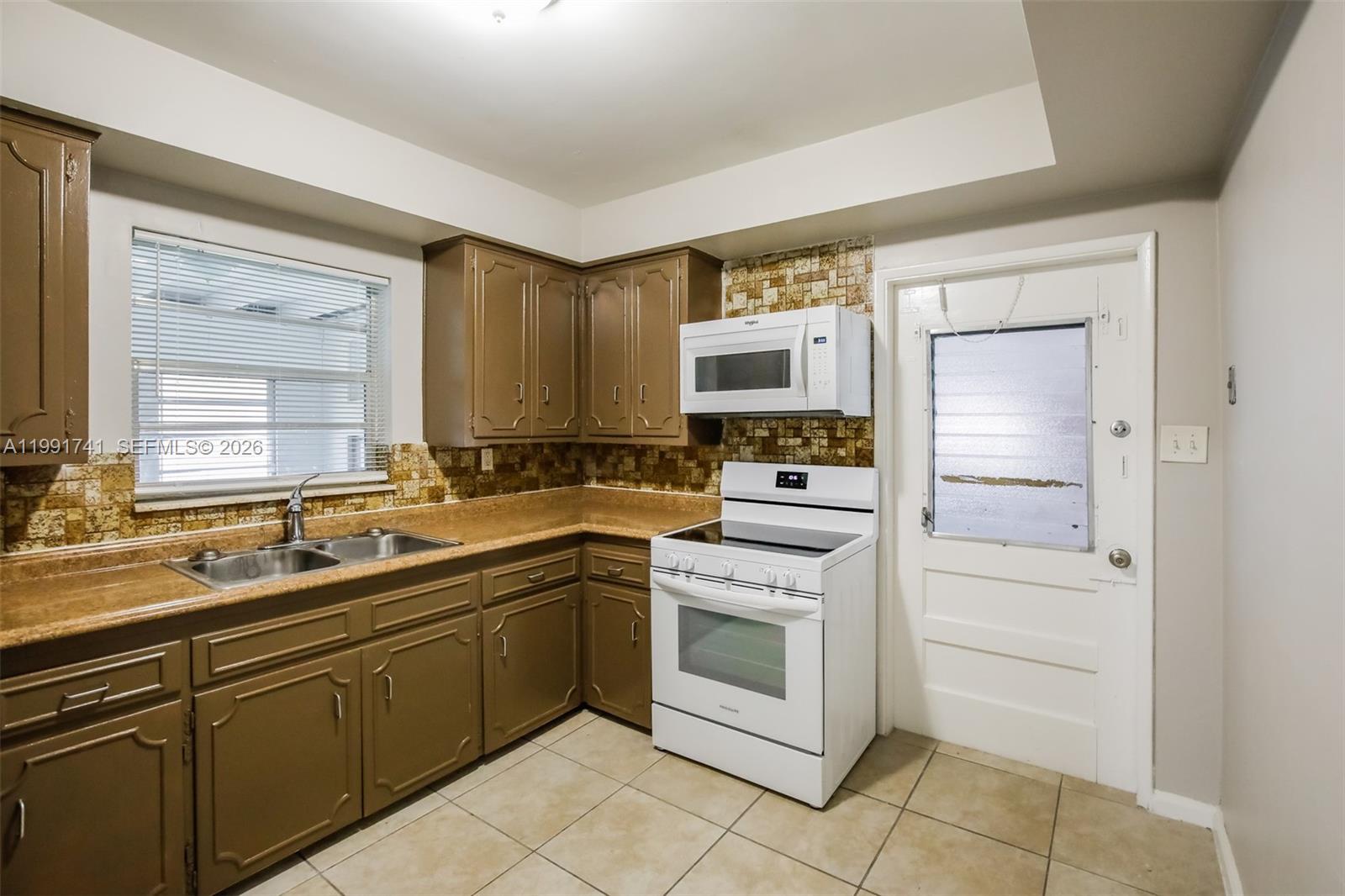 1710 Northwest 109th Street Miami, FL 33167 - Photo 6 of 15