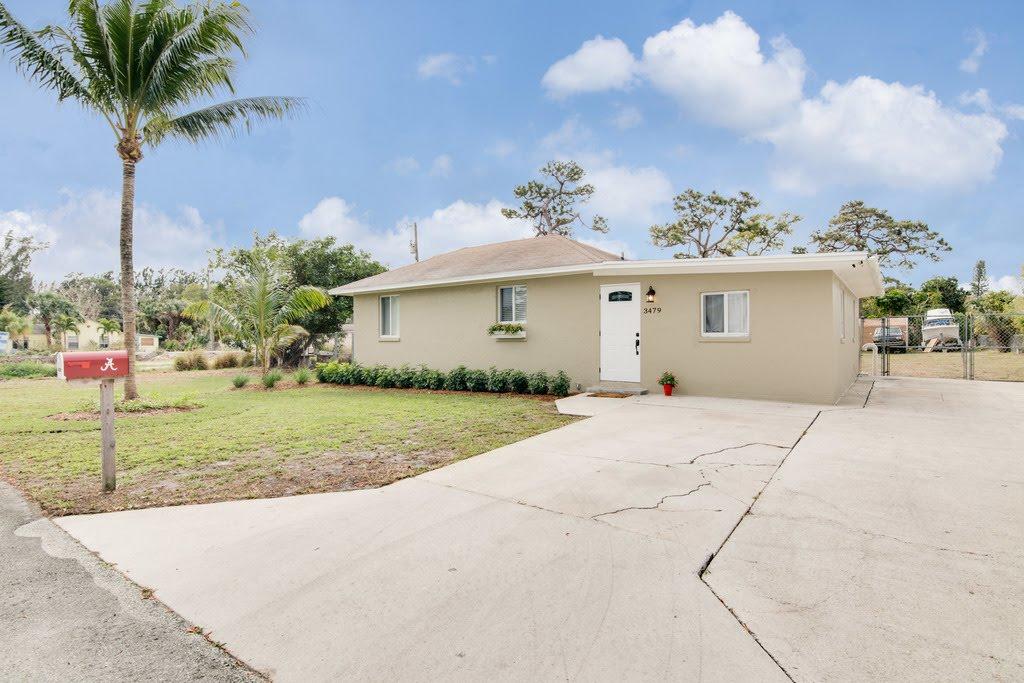 3479 Rostan Lane Lake Worth, FL 33461 - Photo 1 of 21 Front of Home
