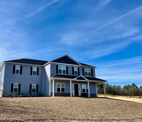 392 Buffalo Creek Road Raeford, NC 28376 - Photo 2 of 34 front view of a house with a street