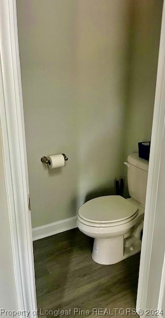 392 Buffalo Creek Road Raeford, NC 28376 - Photo 29 of 34 a white toilet sitting next to a shower