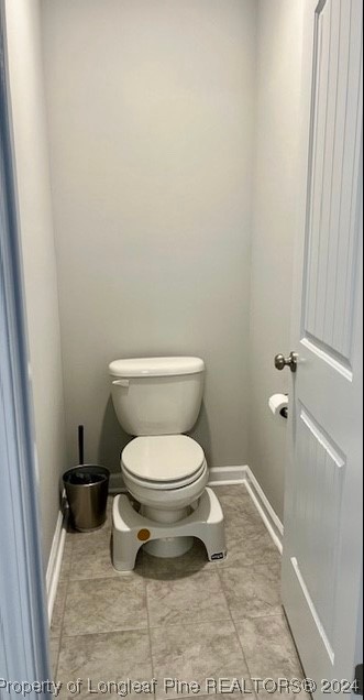 392 Buffalo Creek Road Raeford, NC 28376 - Photo 7 of 34 a white toilet sitting next to a shower