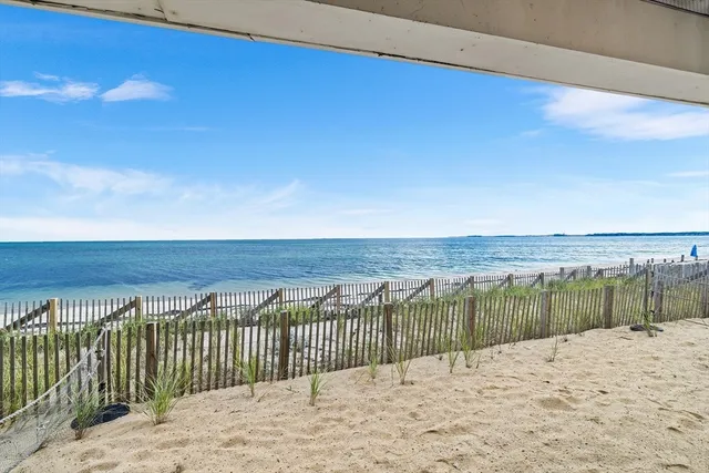 a view of roof deck with furniture