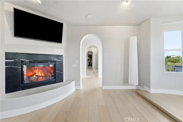 a view of a house with backyard sitting area and garden