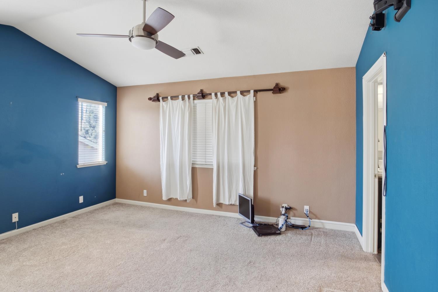 2213 Lionudakis Court Modesto, CA 95355 - Photo 24 of 38 a view of an empty room with a window