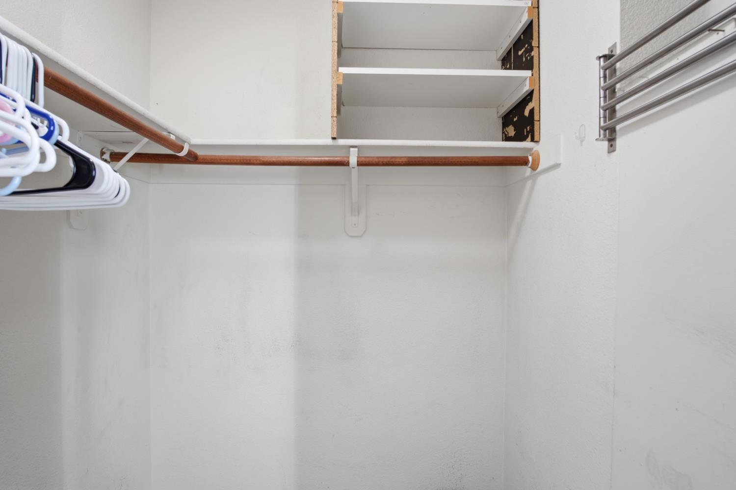 2213 Lionudakis Court Modesto, CA 95355 - Photo 27 of 38 a view of an empty walk in closet