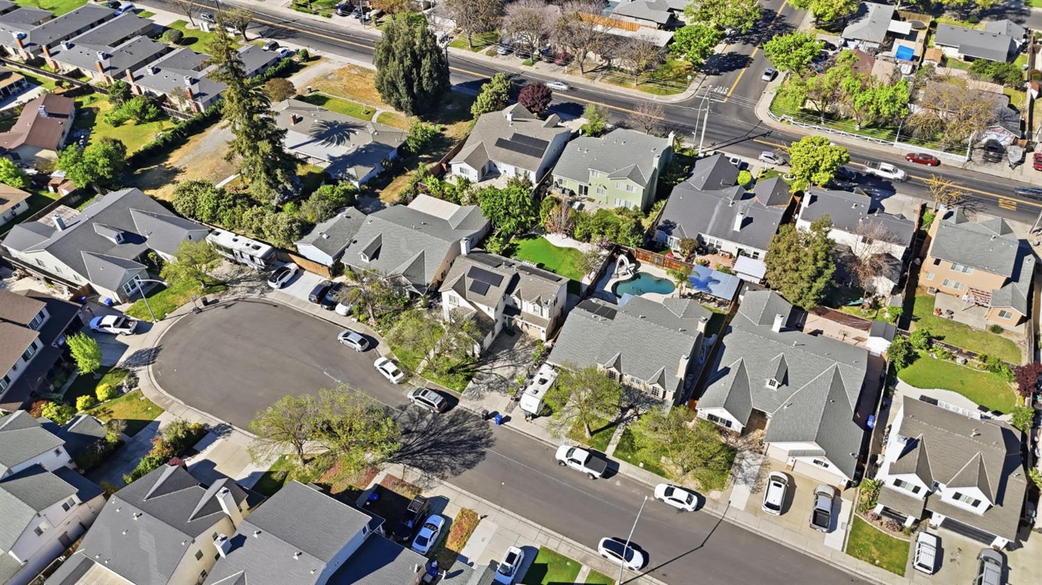 2213 Lionudakis Court Modesto, CA 95355 - Photo 37 of 38 an aerial view of a swimming pool with outdoor space